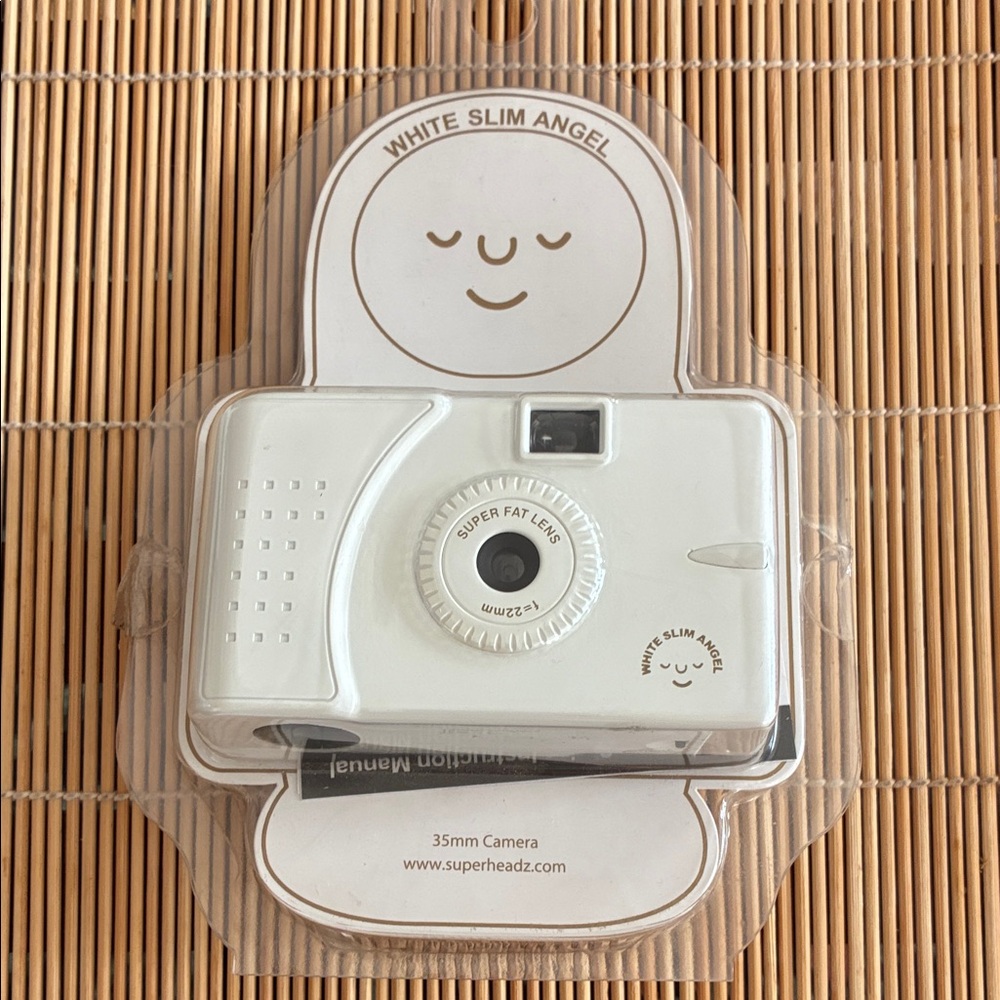 White Slim Angel 35mm Camera by - White